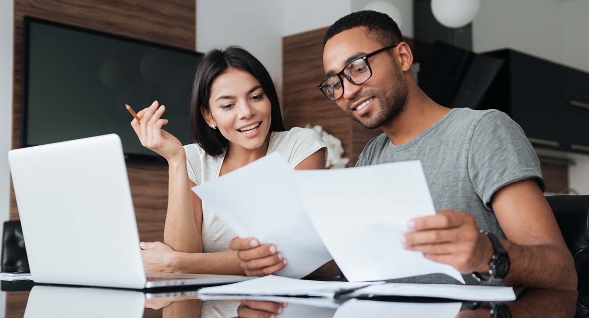 woman and man going through financials